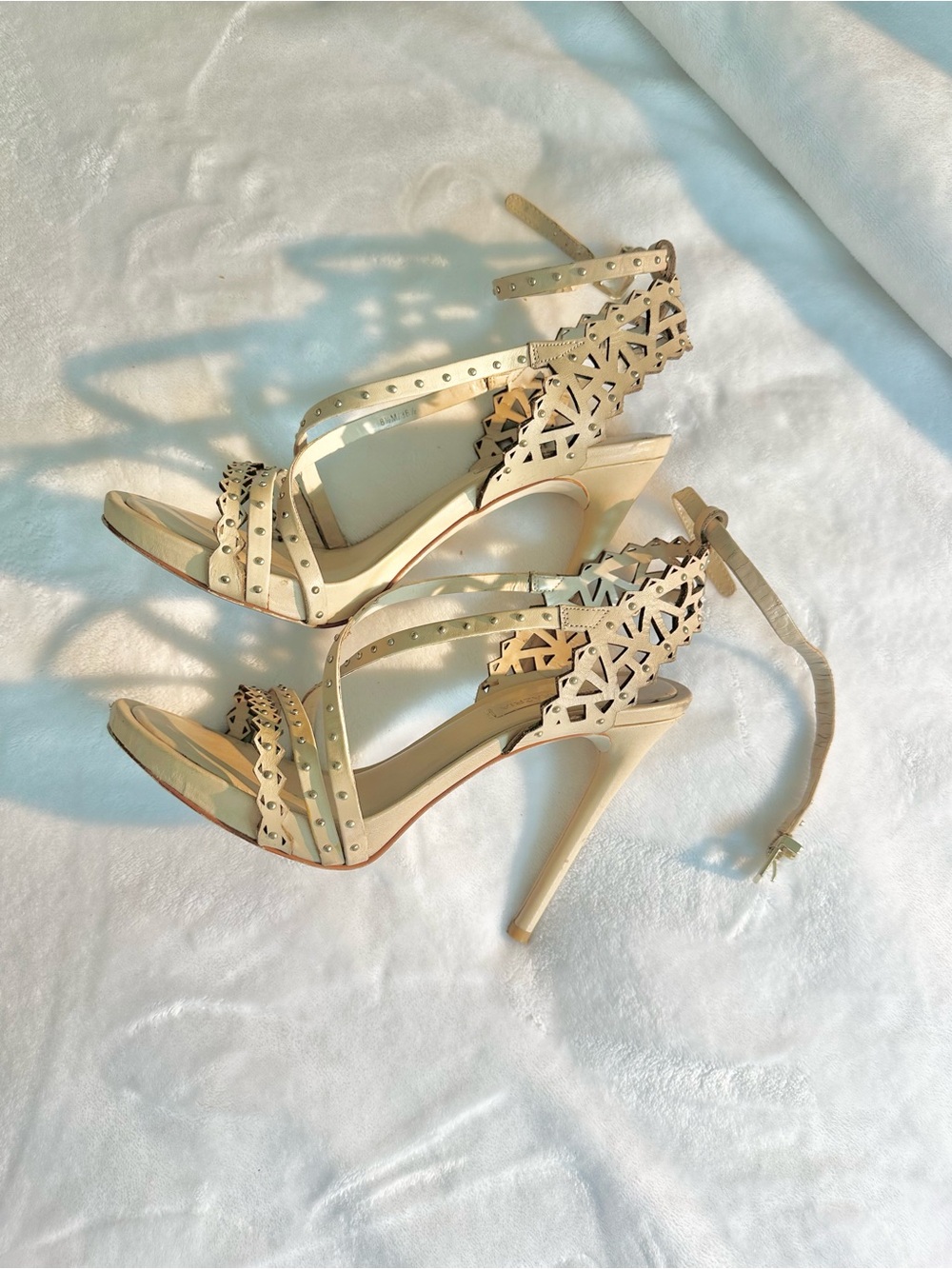 BCBGMaxAzria Cream Laser-Cut Studded Stiletto Sandals